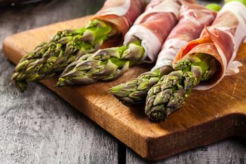 Prosciutto wrapped green asparagus