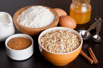 oatmeal, flour, milk and eggs - the ingredients for baking cooki