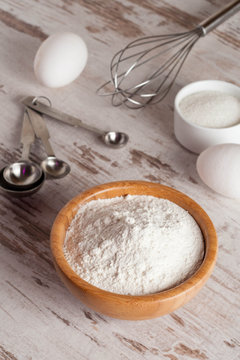 ingredients and tools to make a cake, flour, sugar,eggs