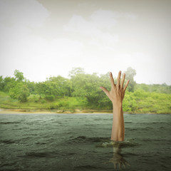single hand of drowning man