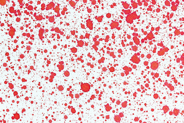 Fototapeta na wymiar Red ink stains on white paper texture.