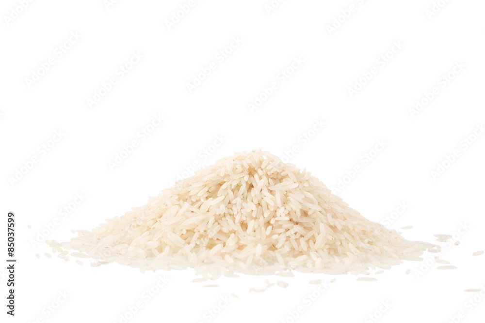 Wall mural small pile of basmati rice isolated on a white