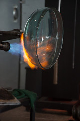 Making a glass bowl with fire