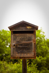 Old metal mail box with nature background