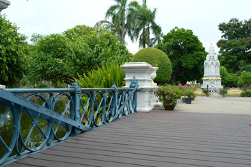 Marble monument tower and wooden bridge at Saranrom Royal Garden, Bangkok, Thailand