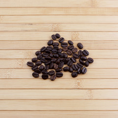 coffee beans on bamboo background