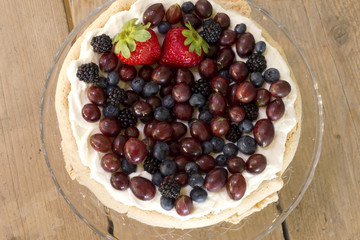 homemade pavlova with fresh  red fruits