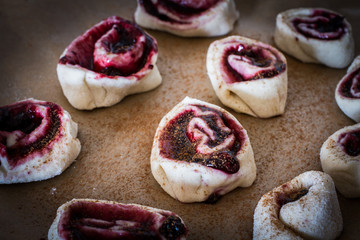 Obraz na płótnie Canvas buns from yeast dough with jam prepared at home