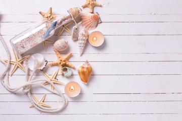 Marine items on wooden background.