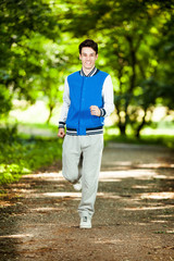 Happy teenager jogging
