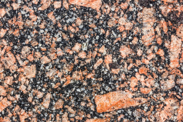 Red granite mineral texture.