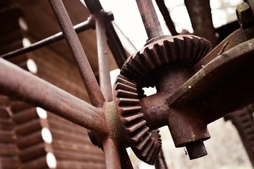 Rusty gear drive. Old hydroelectric power plant