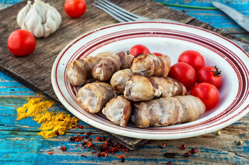 set fried meat sausages on wooden background