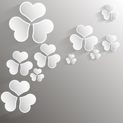 paper shamrock on paper background