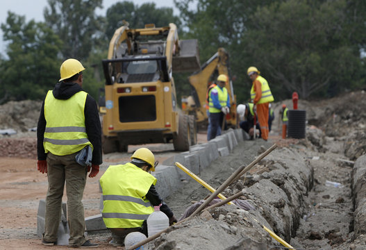 Workers Road Construction Site