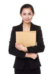 Young businesswoman hold with folder