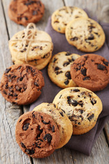 Chocolate chip cookies on grey wooden background