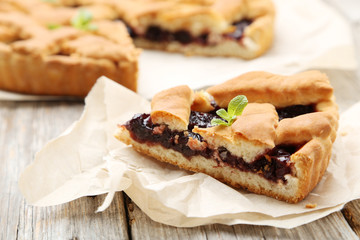 Homemade pie on grey wooden background