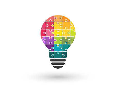 Lightbulb made of colourful puzzle pieces as idea and diversity concept