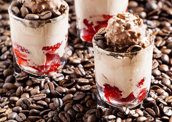 Coffee and chocolate dessert with ice cream and strawberries, se