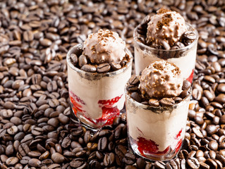 Coffee and chocolate dessert with ice cream and strawberries, se