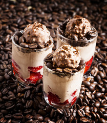 Coffee and chocolate dessert with ice cream and strawberries, se