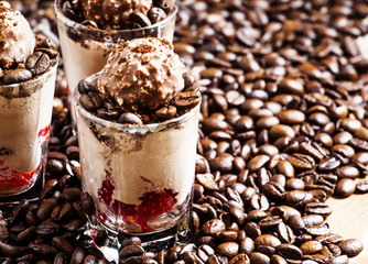 Coffee and chocolate dessert with ice cream and strawberries, se