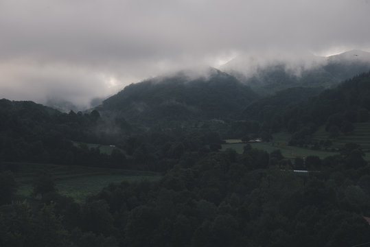 Fototapeta landscape with mountains trees and a river