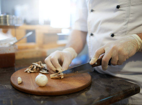 grinding  mushrooms with knife