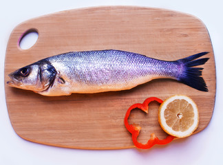 poisson sur une planche