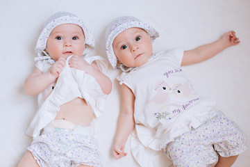 Funny twins sisters babies