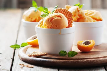 Afwasbaar fotobehang Apricot ice-cream with mint © nolonely
