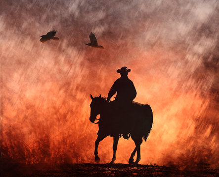 A cowboy on a horse riding into red fire with crows flying above.