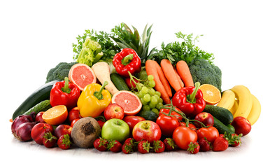Variety of organic vegetables and fruits isolated on white