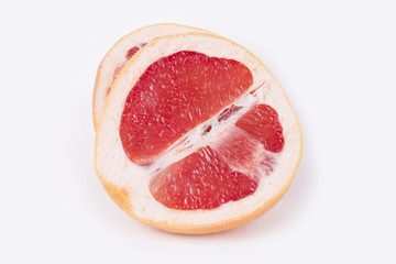 Delicious red blood orange / grapefruit (white studio background)