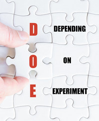 Fototapeta premium Last puzzle piece with Business Acronym DOE