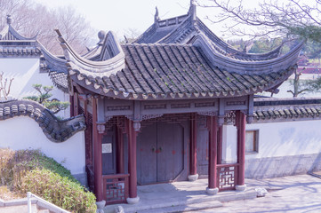 Fototapeta premium Chinese traditional gate in Osaka turumi park,Japan.