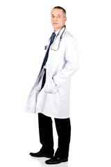 Male doctor with hands in pockets