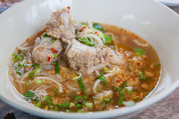 Tom yum noodles and soft pork ribs, Thai food.