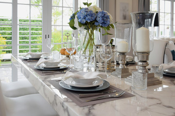 elegant table set in vintage style dining room interior