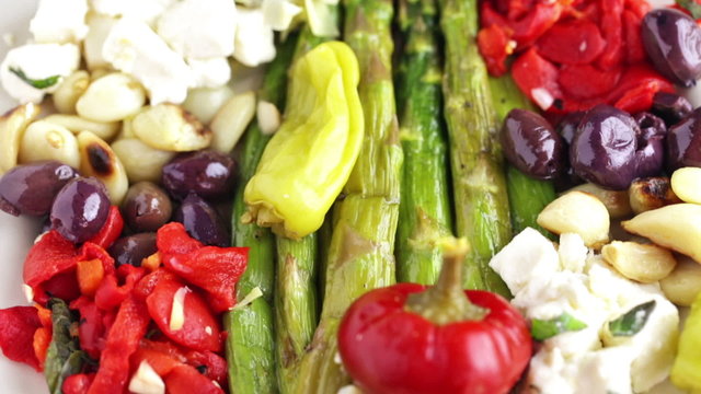 Appetizers plate with vegetarian antipasto in Italian restaurant.