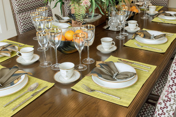 elegant table set in modern style dining room interior