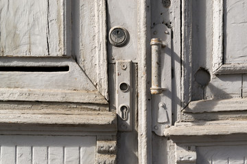 Grey Painted Old Wooden Doorhandle and Lock