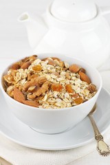 Oatmeal flakes with nuts in bowl