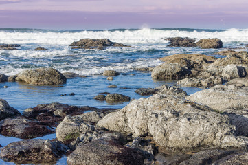 Fototapeta na wymiar Coastal scene with waves and angry sky