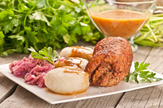 Traditional Polish, Silesian dish. Meat roulade with potato dump