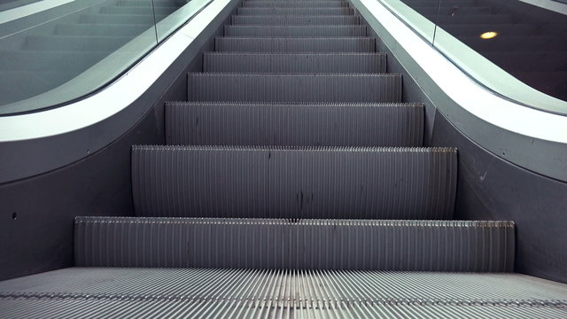 Escalators in Modern Urban Interior, Moving Staircase as Easy Opportunity or Success Concept.