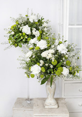 Flower arrangement with white carnations