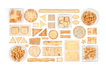 crackers and snacks on white background