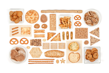 crackers and snacks on white background